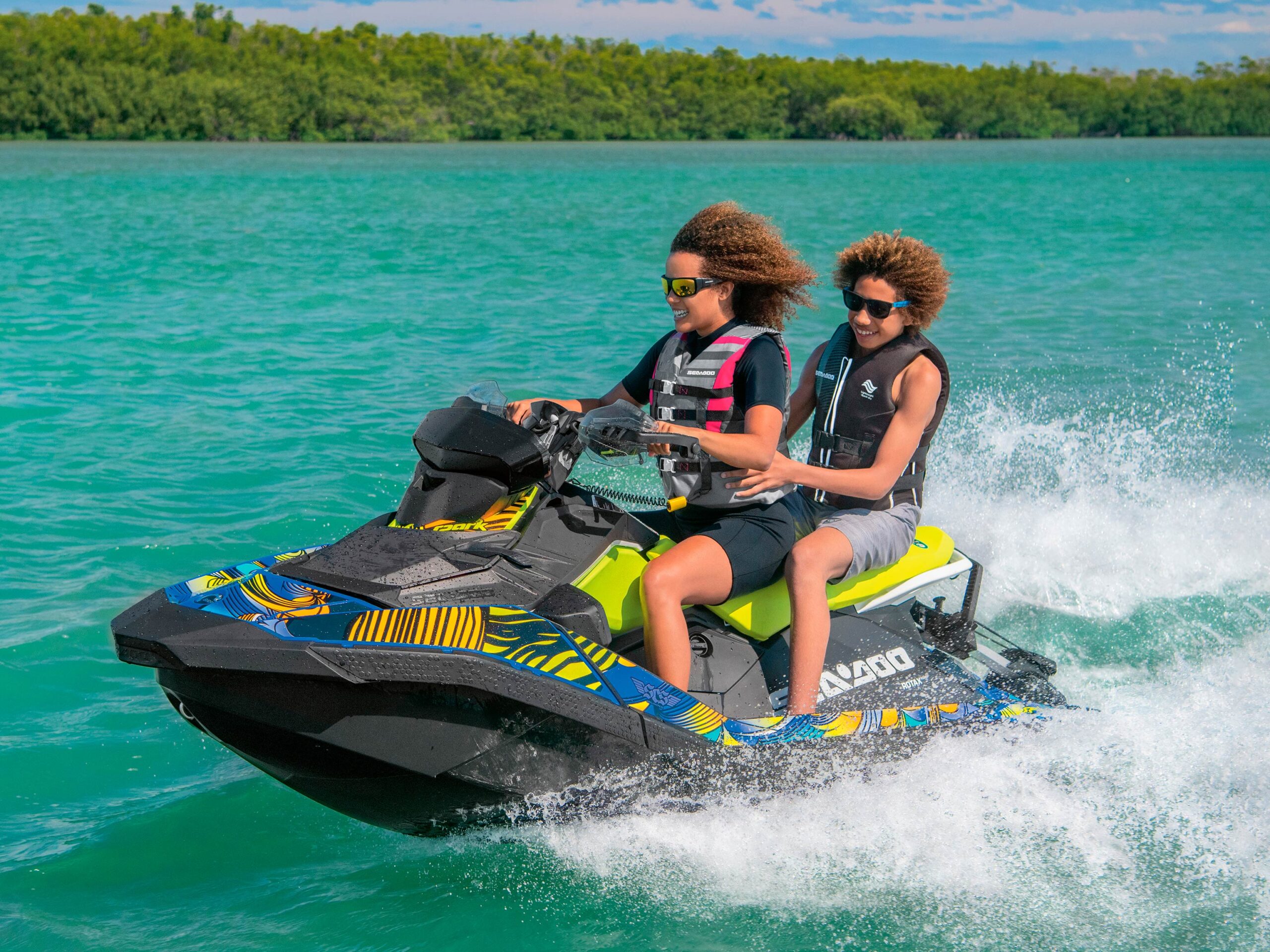 Mother and son riding a Sea-Doo SPARK